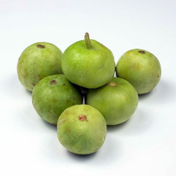 Five green, round fruits with small brown stem remnants, clustered together on a clean white background.